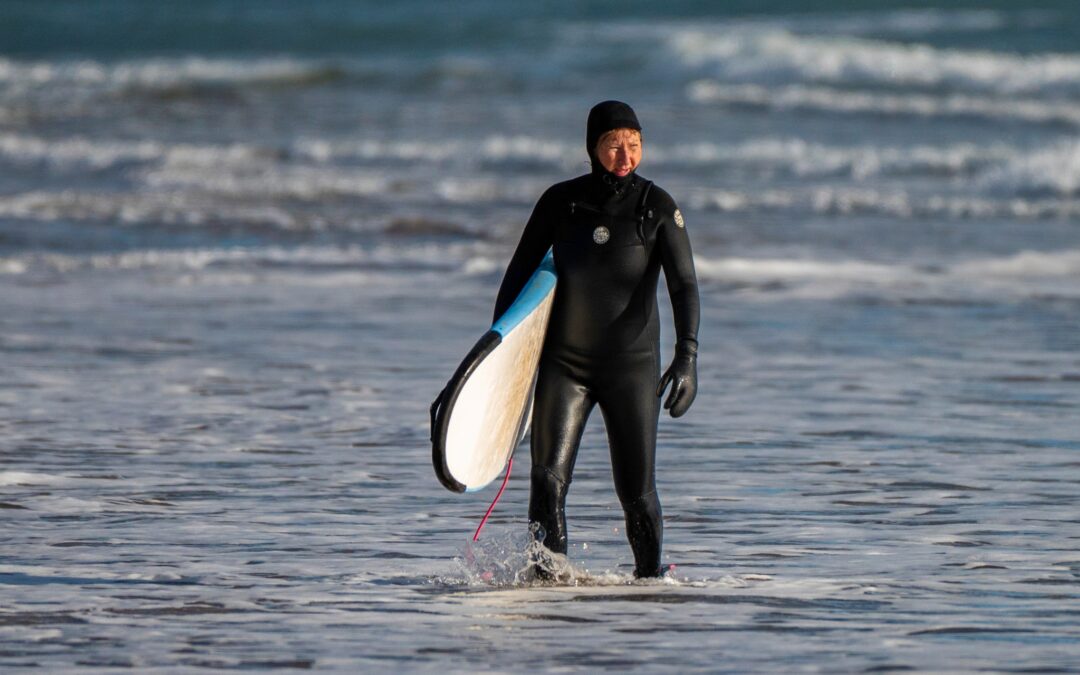Surfing Lawrencetown beach, nova scotia