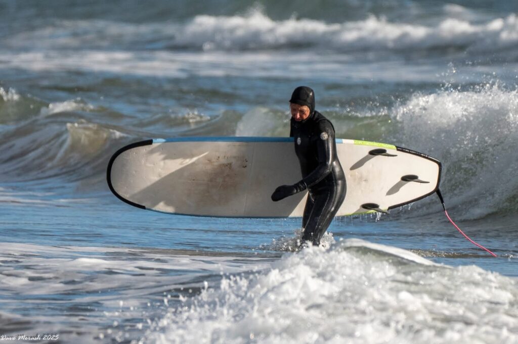 Surfing Lawrencetown Beach Mary walk out