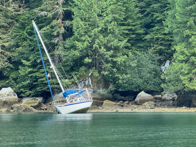 Boat aground at anchor, Princess Louisa Inlet, by Chatterbox Falls