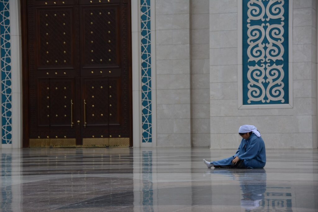 Nur-Astana Mosque, woman praying