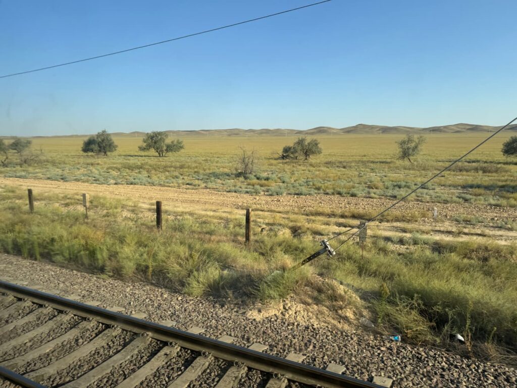Train to Almaty, Kazakhstan steppe, rails