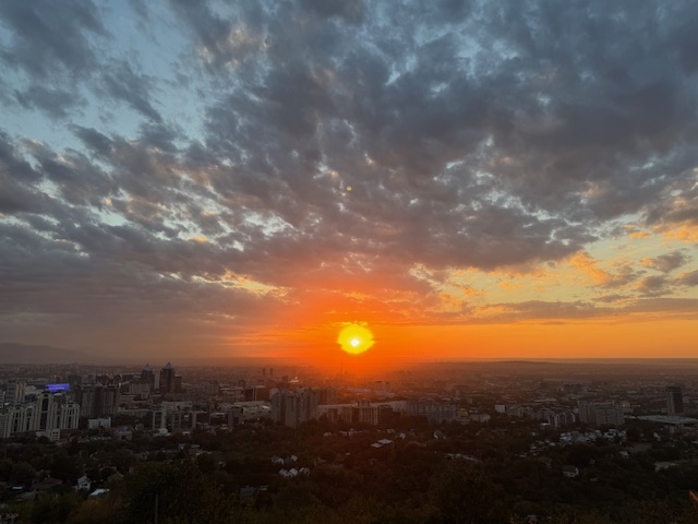 Almaty at sunset from Kobe Tobe hill above the city